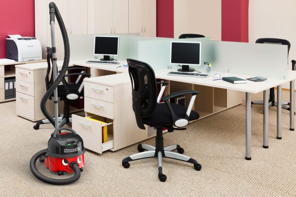 Numatic NBV190NX Battery Henry Hoover in Office on Beige Carpet